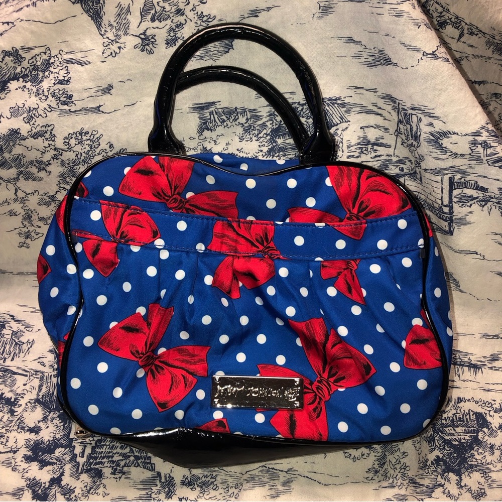 BETSY JOHNSON BLUE WITH WHITE POLKA DOTS RED BOWS HANDBAG.